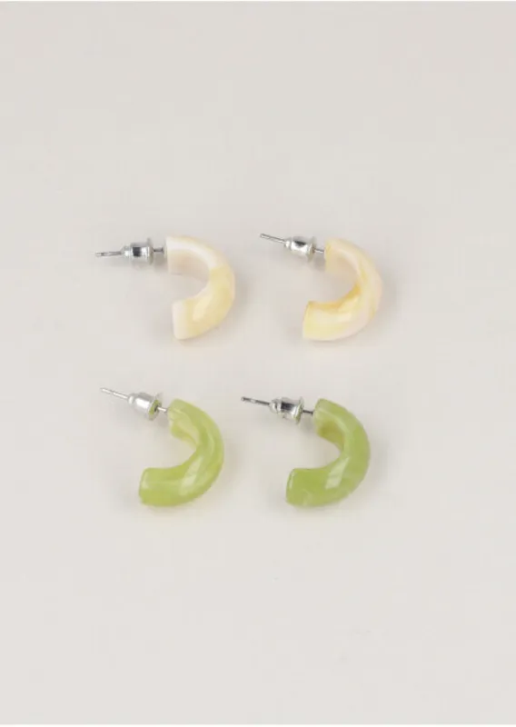 Set 2 Pr Arracadas Acrilico sold by Shasa