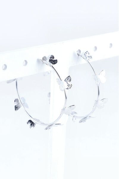 Arracadas metálicas mariposas sold by Shasa