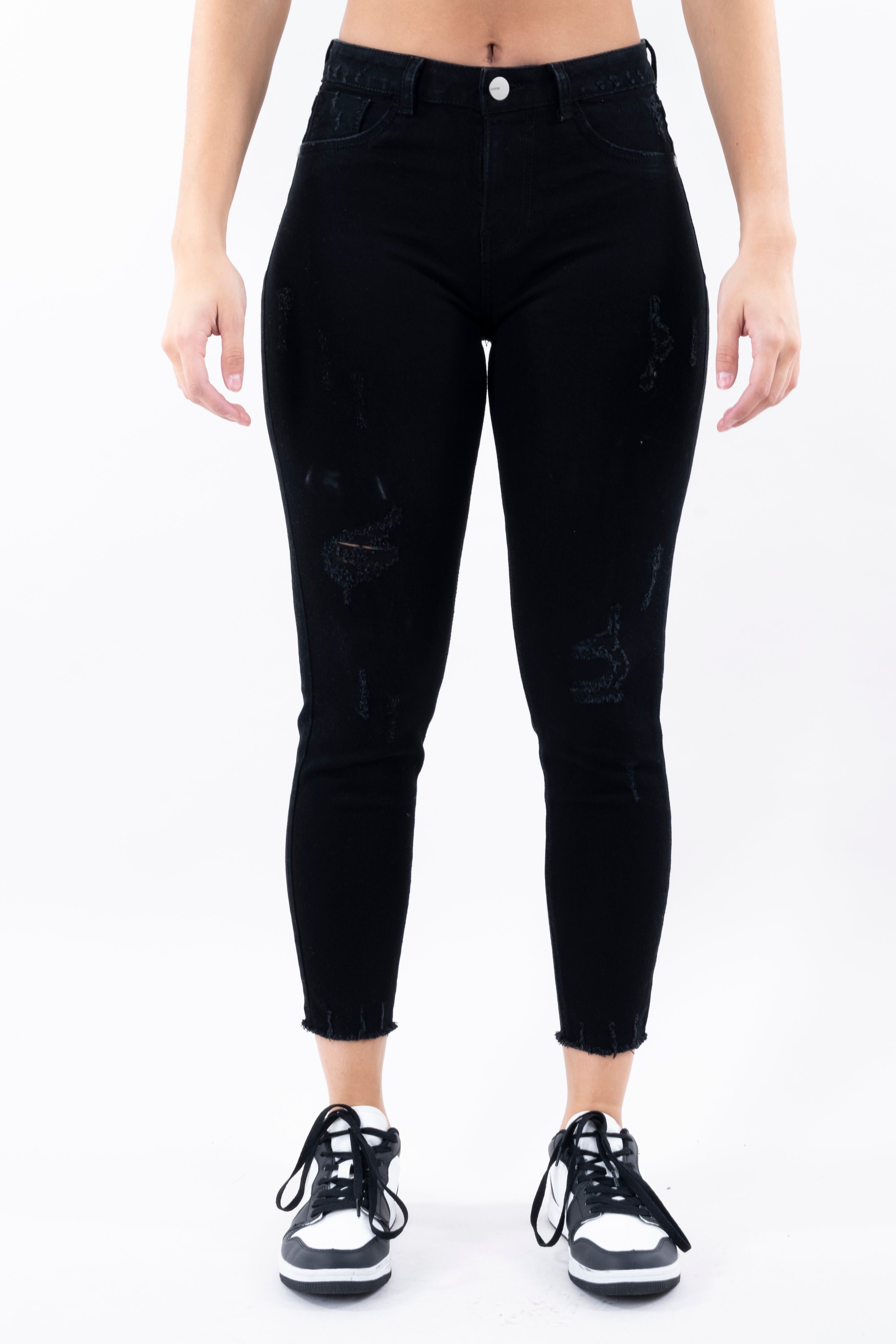 Jeans cintura media destrucciones flecos sold by Shasa