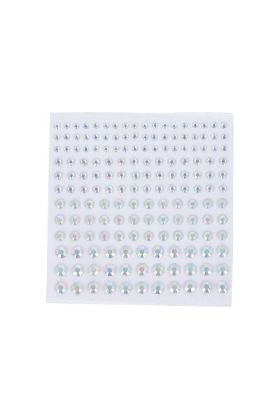 Brillos faciales iridiscentes sold by Shasa