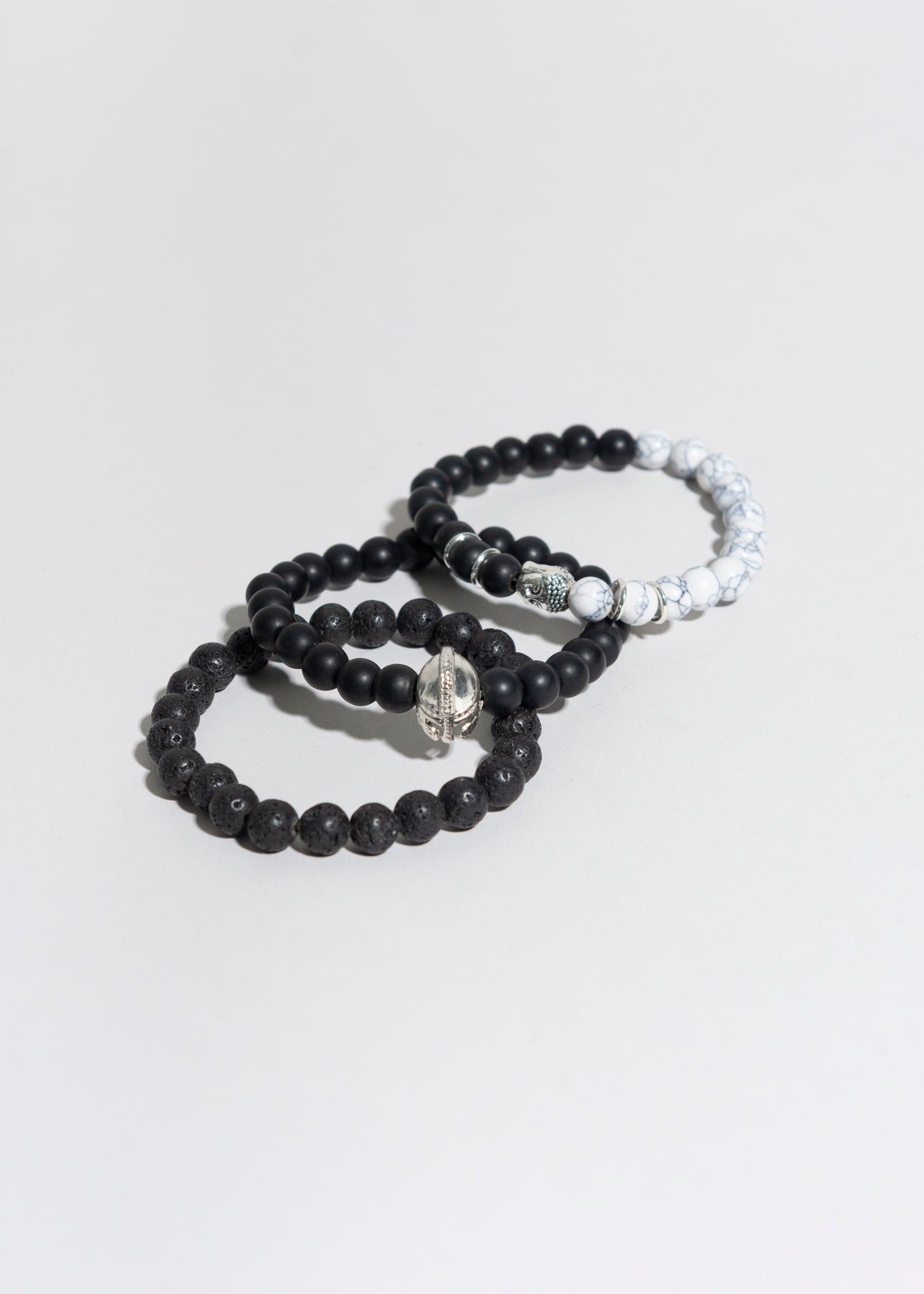 Set 3 pulseras dijes sold by Shasa