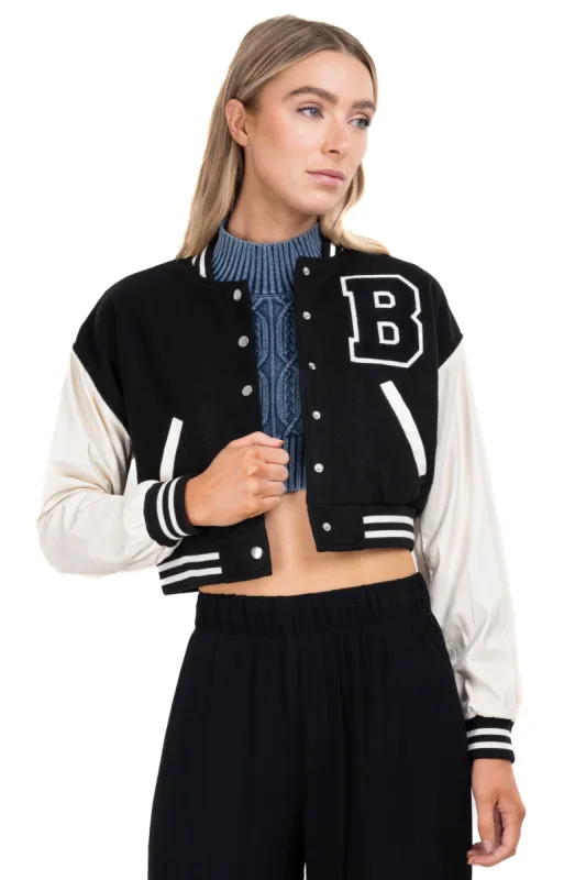 Chamarra varsity bicolor sold by Shasa