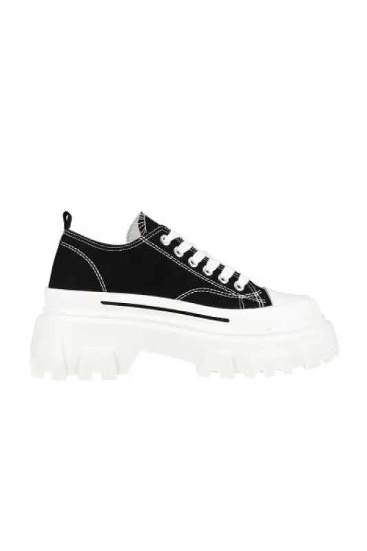 Tenis canvas suela chunky sold by Shasa