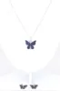Set Aretes Collar Mariposa Color sold by Shasa