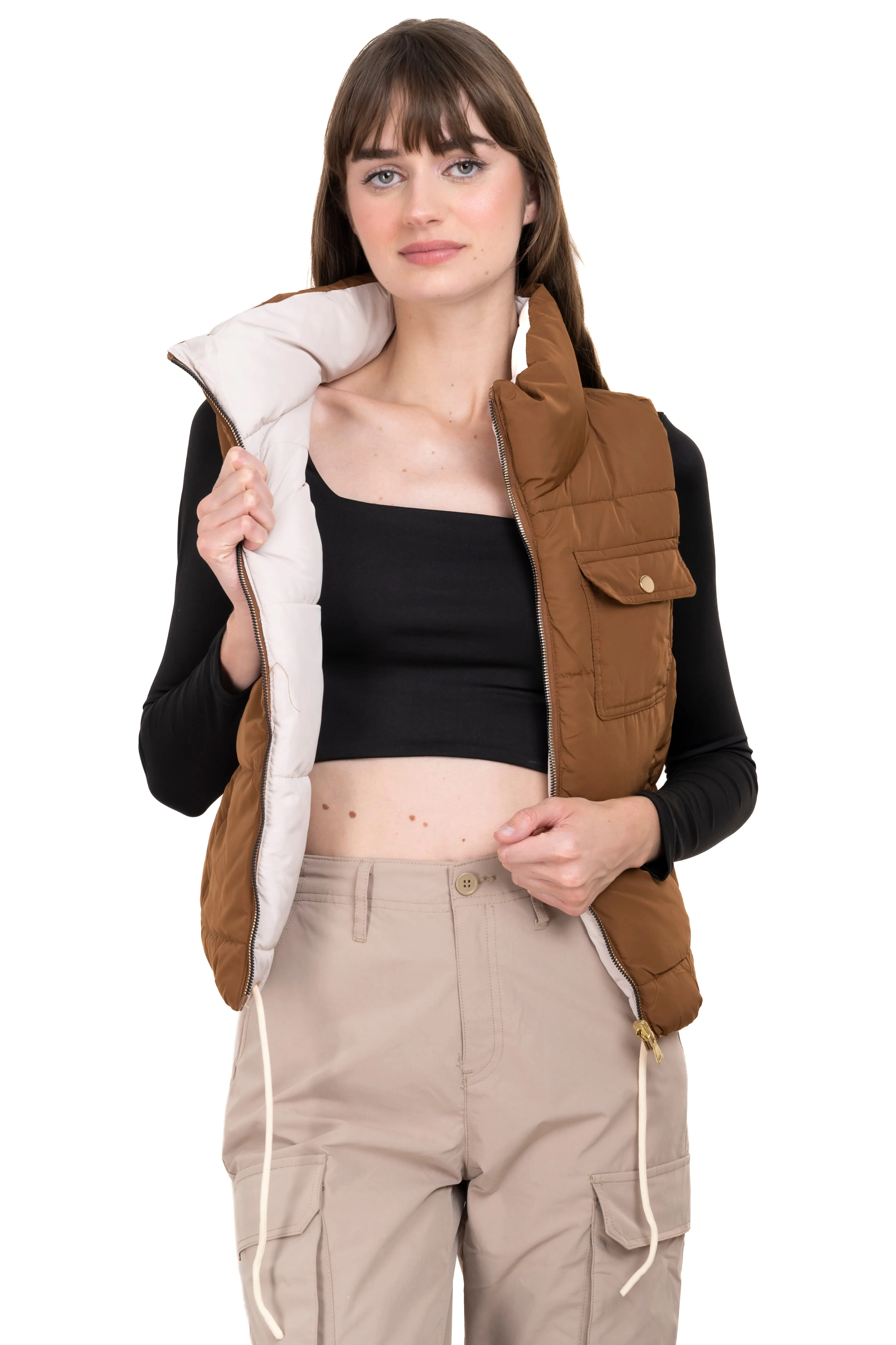 Chaleco capitonado bolsillos cuello alto sold by Shasa