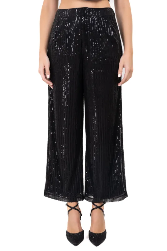 Pantalón recto lentejuelas sold by Shasa