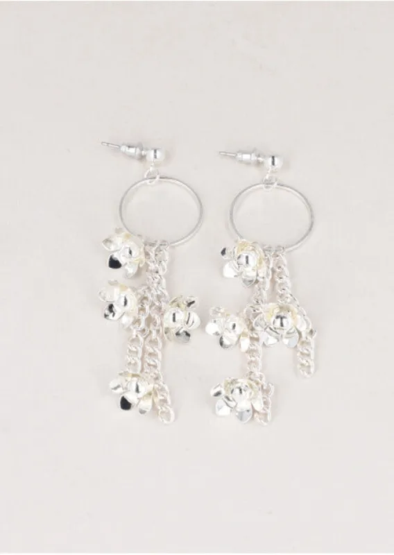 Aretes Circulo Flores Metal sold by Shasa