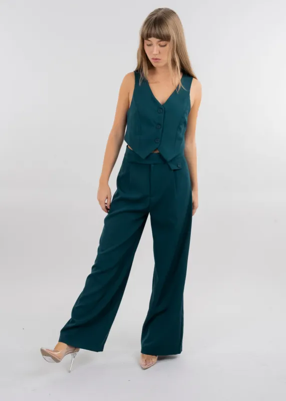 Pantalón sastre pinzas sold by Shasa