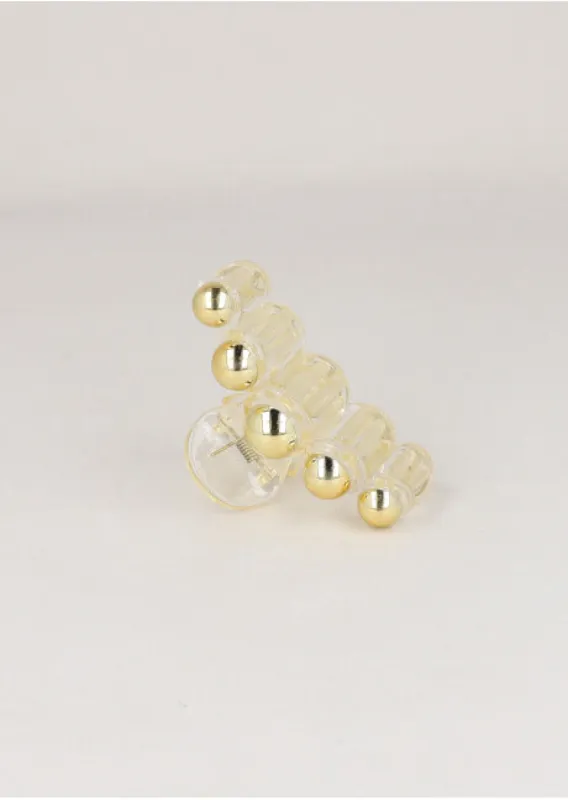 Pinza Círculos Metálicos sold by Shasa