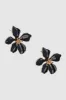 Aretes Flor Esmalte sold by Shasa