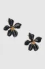 Aretes Flor Esmalte sold by Shasa