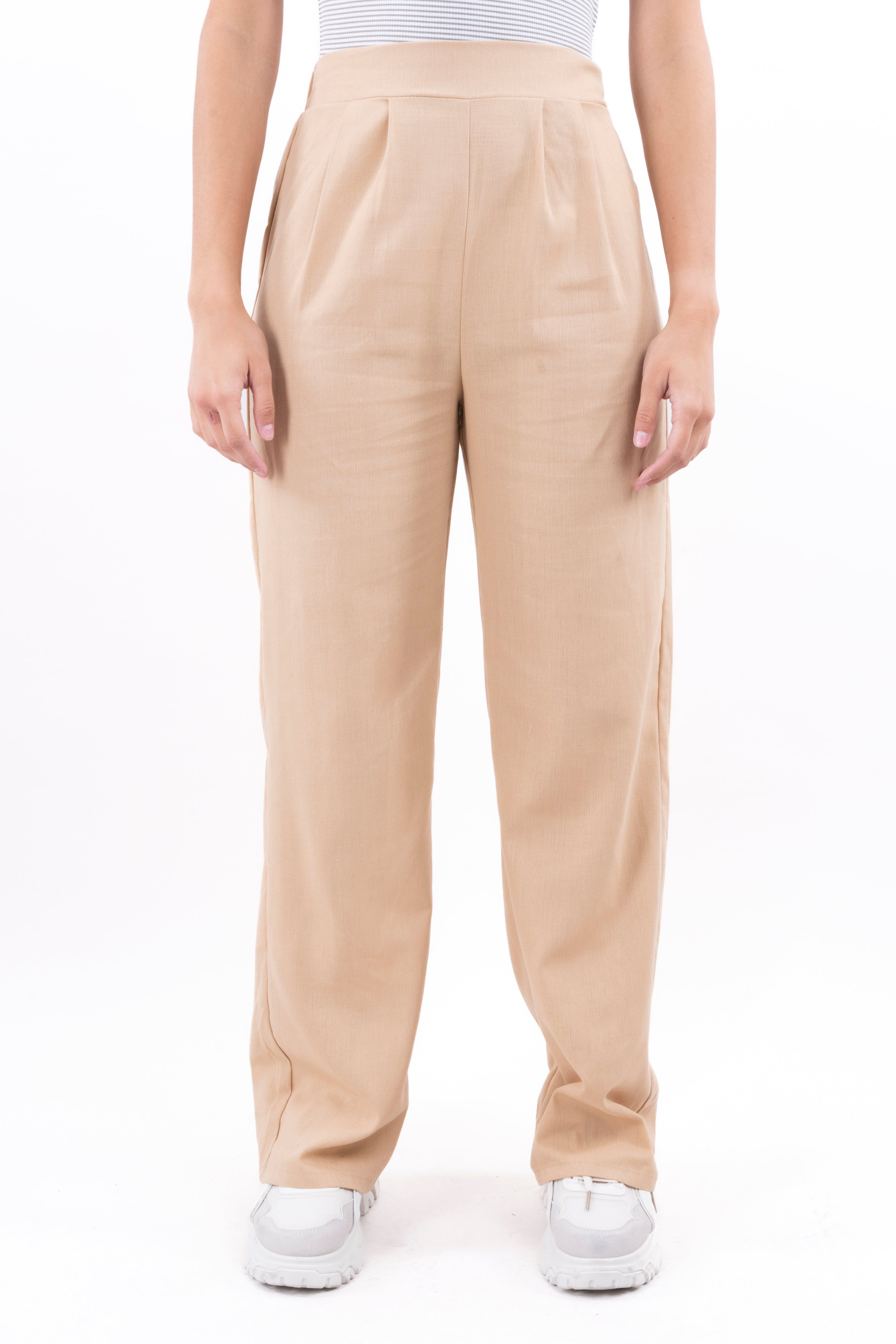 Pantalón amplio lino pinzas sold by Shasa