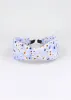 Diadema Ancha Twist Flores sold by Shasa