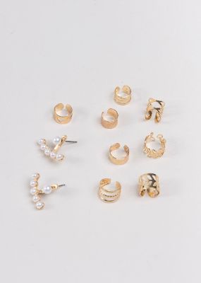 Set 8 piezas earcuff aretes sold by Shasa