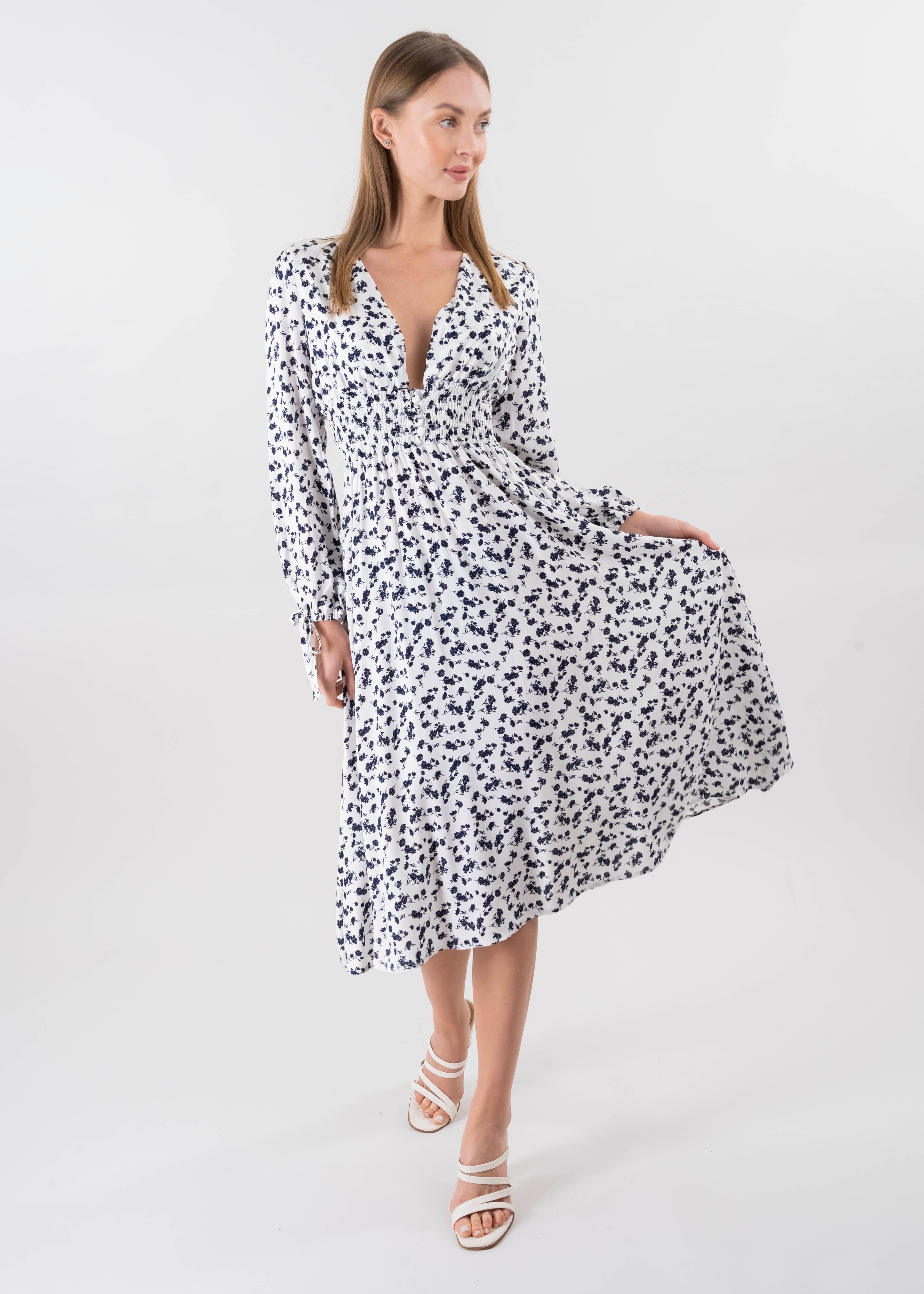 Vestido midi escote v botones sold by Shasa