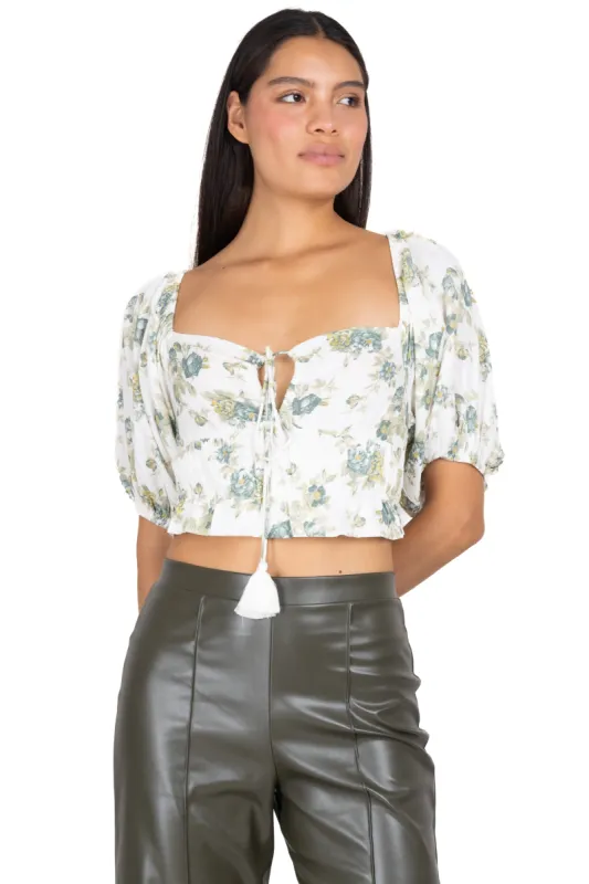 Blusa abertura cintas flores sold by Shasa