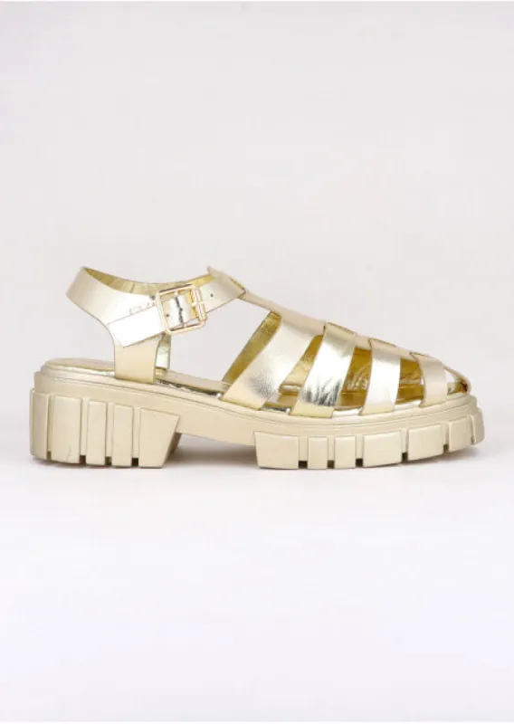 Sandalias cangreja metálica sold by Shasa