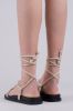 Sandalias planas lace up nudos sold by Shasa