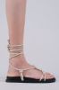 Sandalias planas lace up nudos sold by Shasa