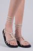 Sandalias planas lace up nudos sold by Shasa