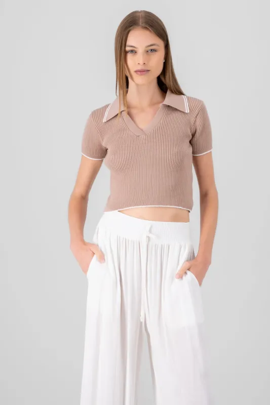 Top polo tejido contraste color Hypsters sold by Shasa