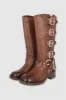 BOTA MOTERA 6 HEBILLAS TIRAS ARO sold by Shasa