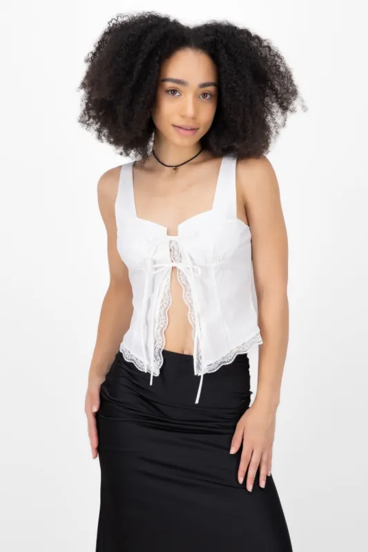 Top de lace up con encaje sold by Shasa