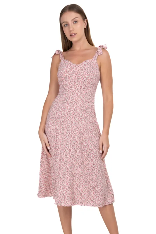 Vestido midi flores moños sold by Shasa