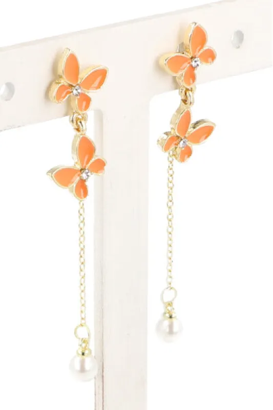 Aretes Doble Mariposa Perla sold by Shasa