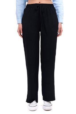 Pantalón fluido cintas sold by Shasa