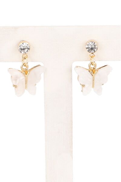Aretes colgantes mariposa sold by Shasa