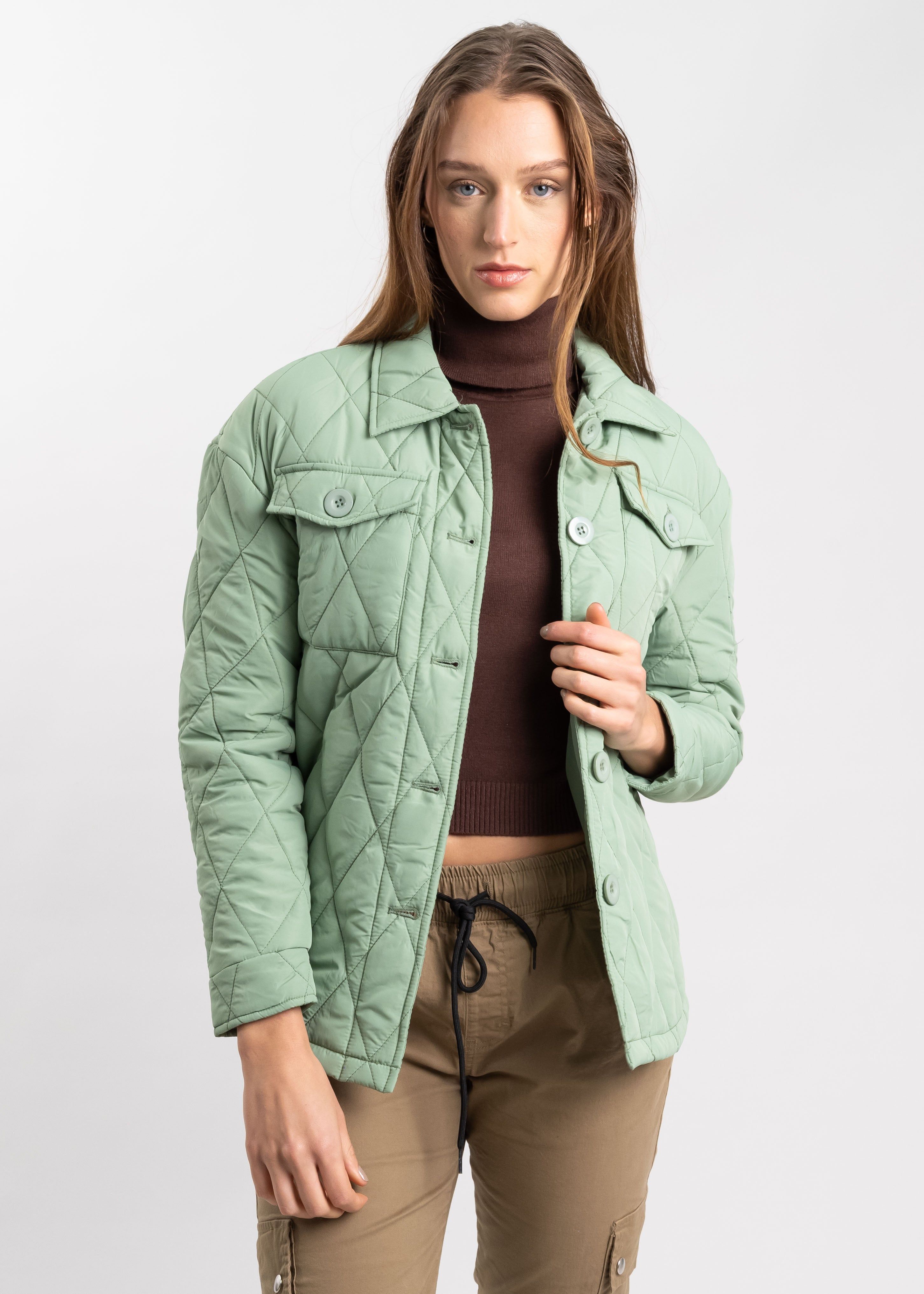 Chamarra capitonada botones sold by Shasa