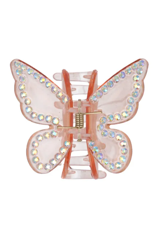 Pinza transparente mariposa brillos sold by Shasa