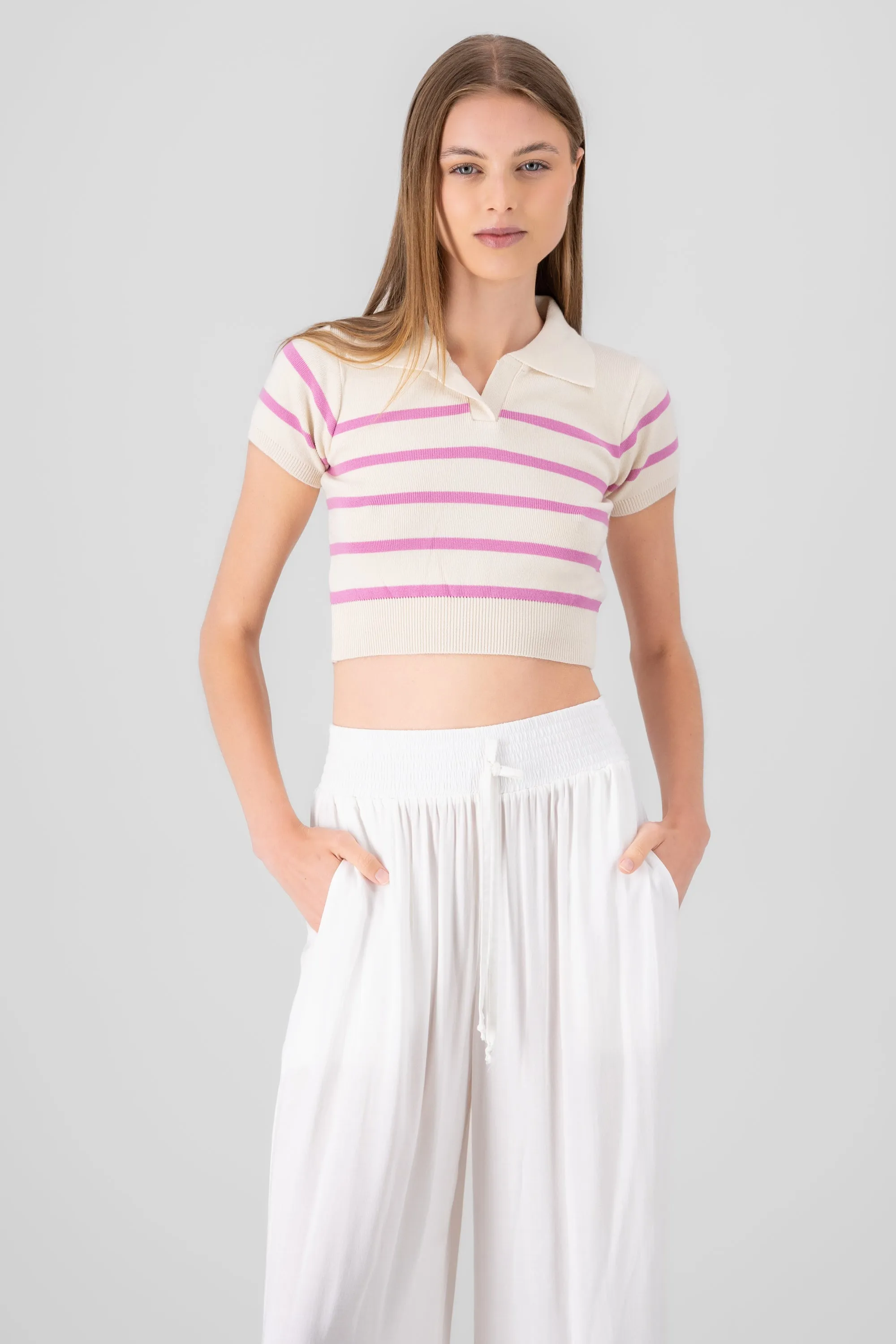 Top tejido cuello polo rayas sold by Shasa