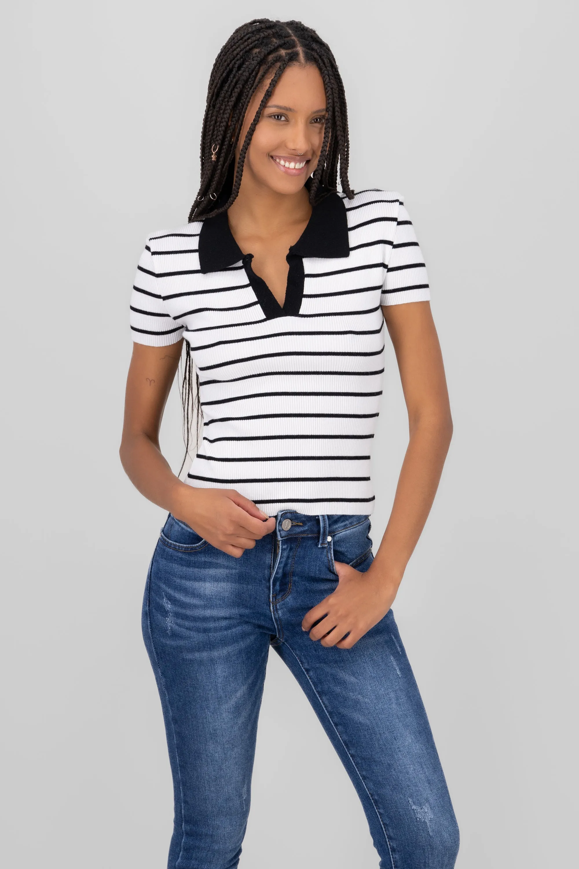 Top rayas cuello polo contraste sold by Shasa