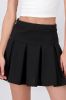 Falda mini lisa tableada sold by Shasa
