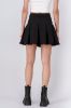 Falda mini lisa tableada sold by Shasa