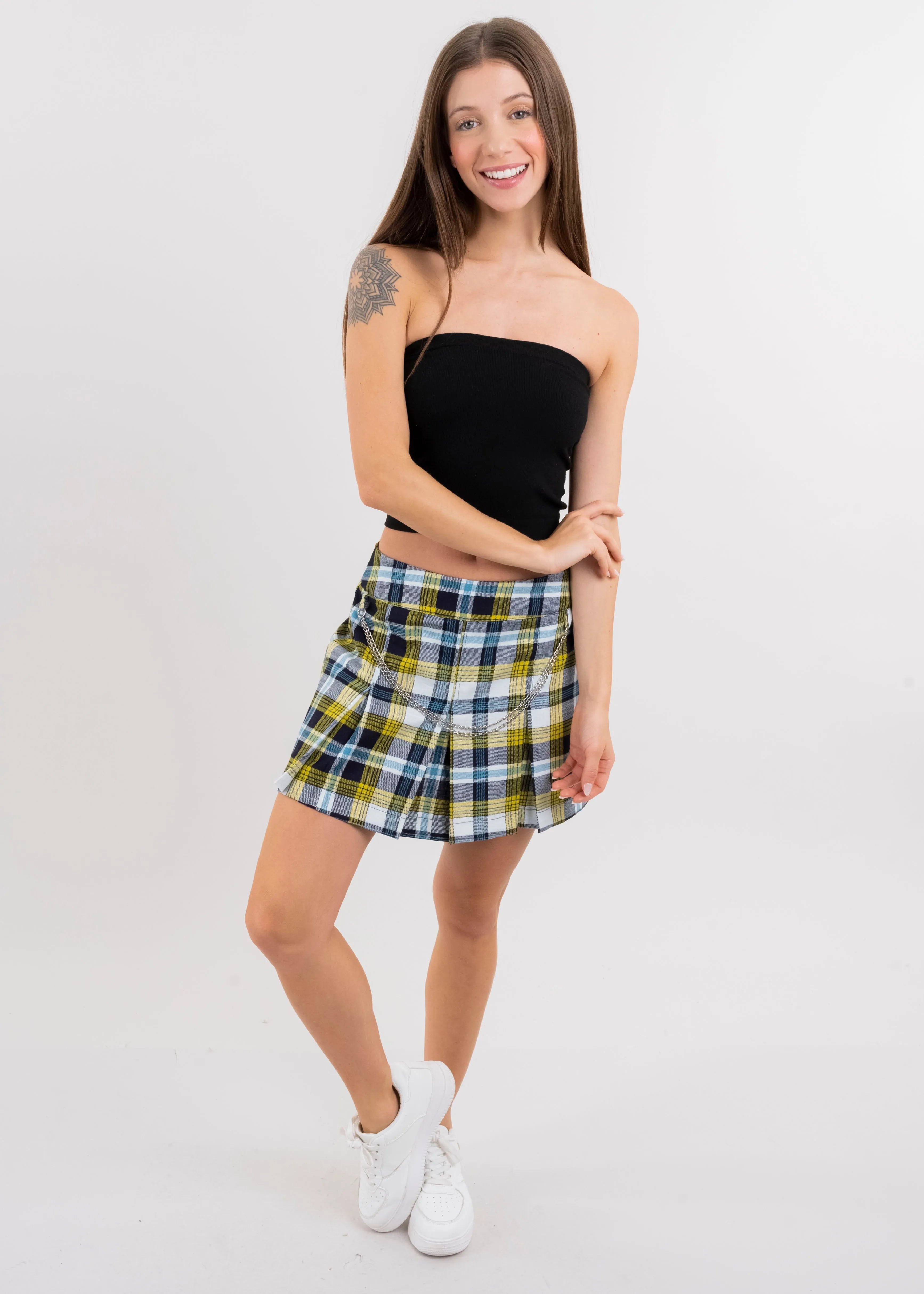 Falda mini cintura baja cadenas sold by Shasa