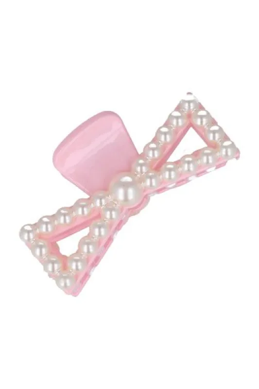 Pinza moño perlas sold by Shasa