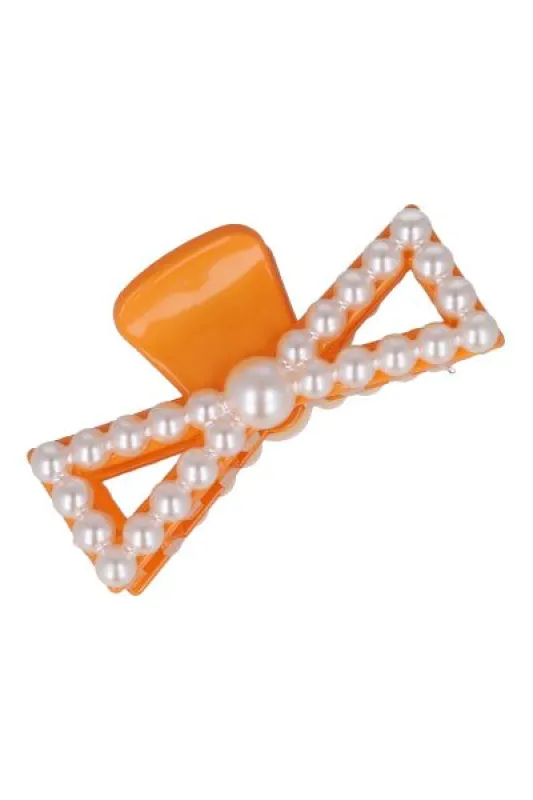 Pinza moño perlas sold by Shasa