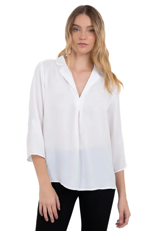 Blusa satín lisa mangas botón sold by Shasa