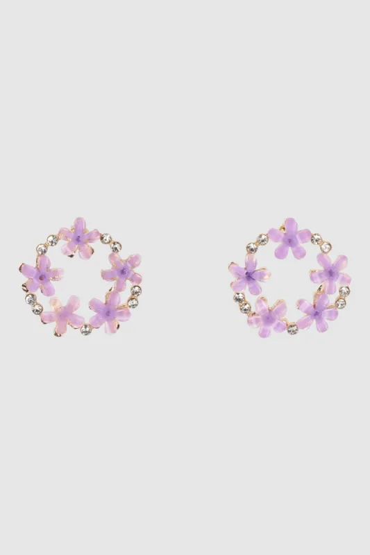Aretes de flores en círculo de color sold by Shasa