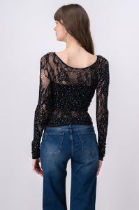 Blusa encaje brillos sold by Shasa