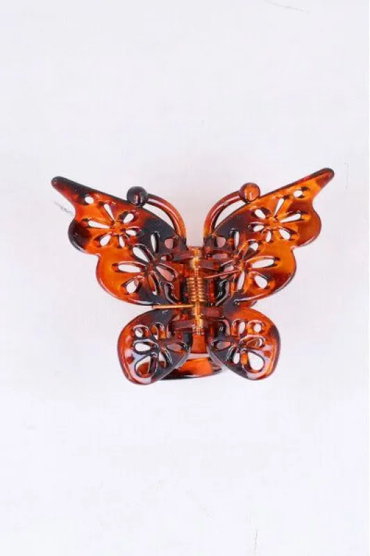 Pinza mariposa flores perforadas sold by Shasa