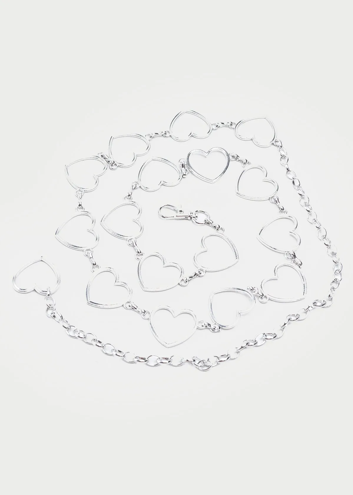 cinturon cadena corazones sold by Shasa