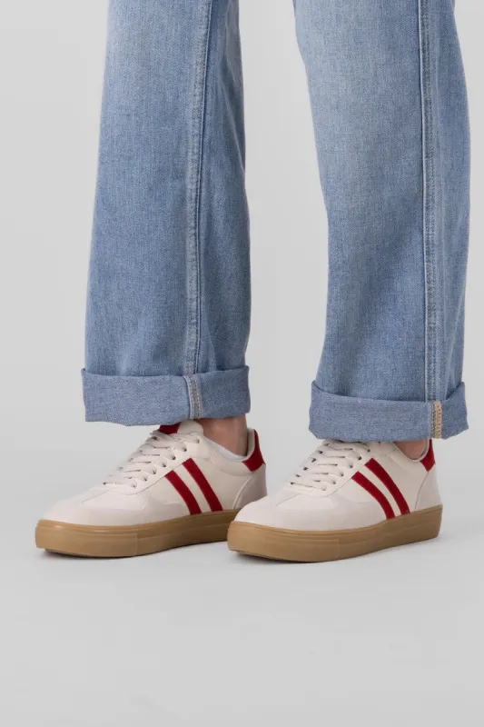 TENIS DOS LINEAS SUELA ALTA sold by Shasa