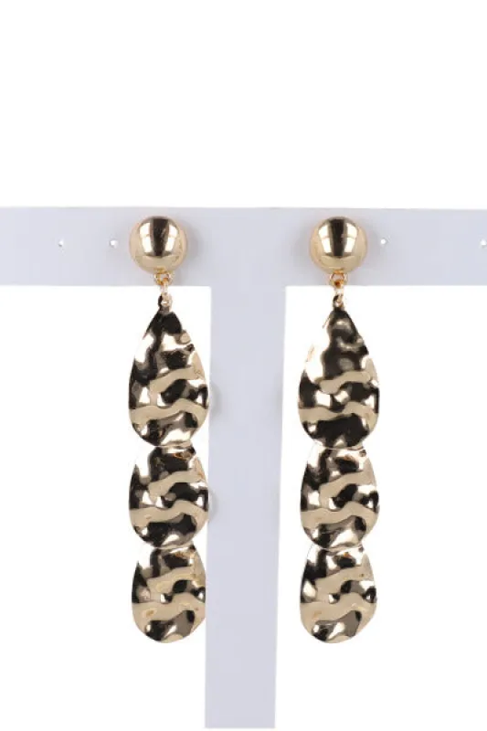 Aretes gotas texturizadas sold by Shasa