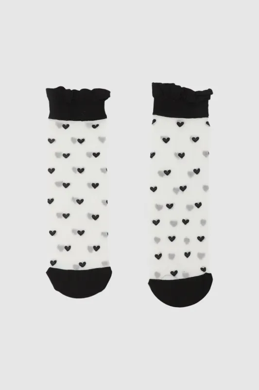 Calcetín de mesh con bordados sold by Shasa