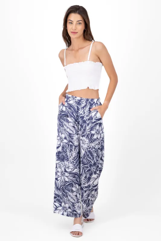 Pantalon fluido tropical sold by Shasa