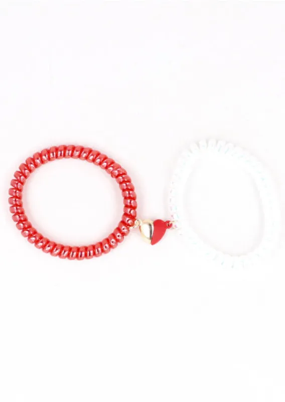 Set Pulseras Telefono Corazon Iman sold by Shasa
